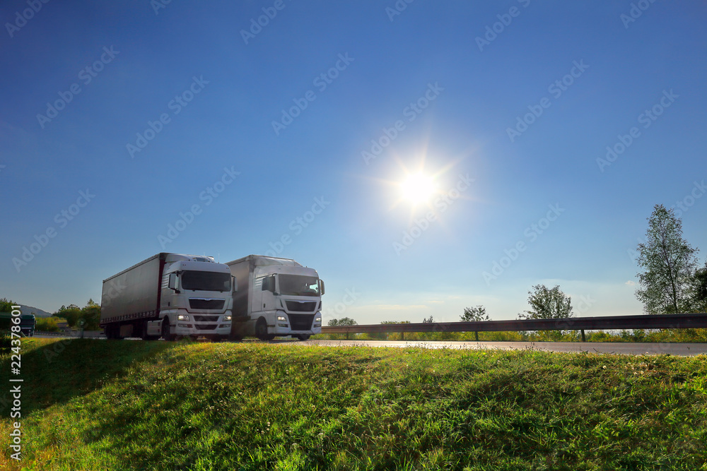 Truck transportation on the road at sunset Truck transportation on the road at sunset