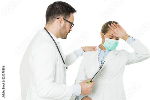 Male and  sad female doctor