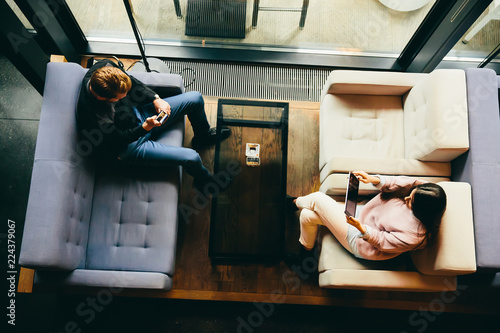 Young couple talking and su...