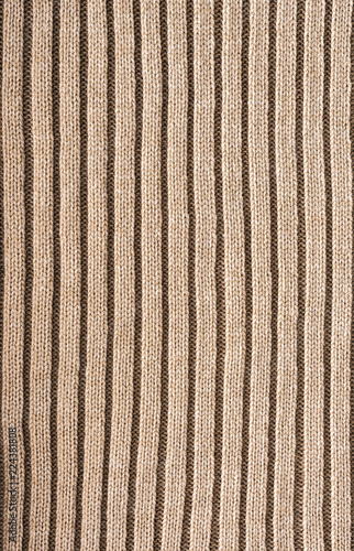 full frame of knitted cloth with pattern as background photo