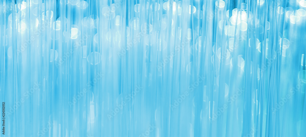 Fiber optics threads with lights on blue background Fiber optics threads with lights on blue background