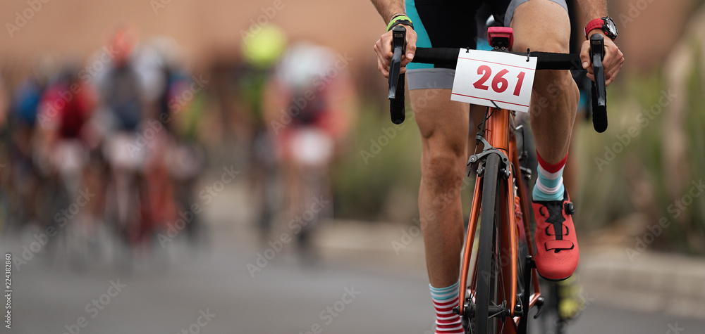 Obraz premium Cycling competition,cyclist athletes riding a race at high speed