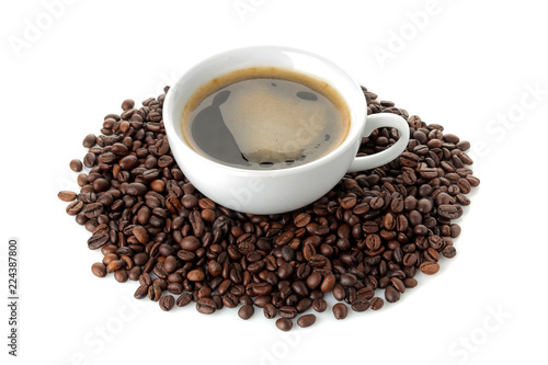 coffee beans in a white cup on a white isolated background