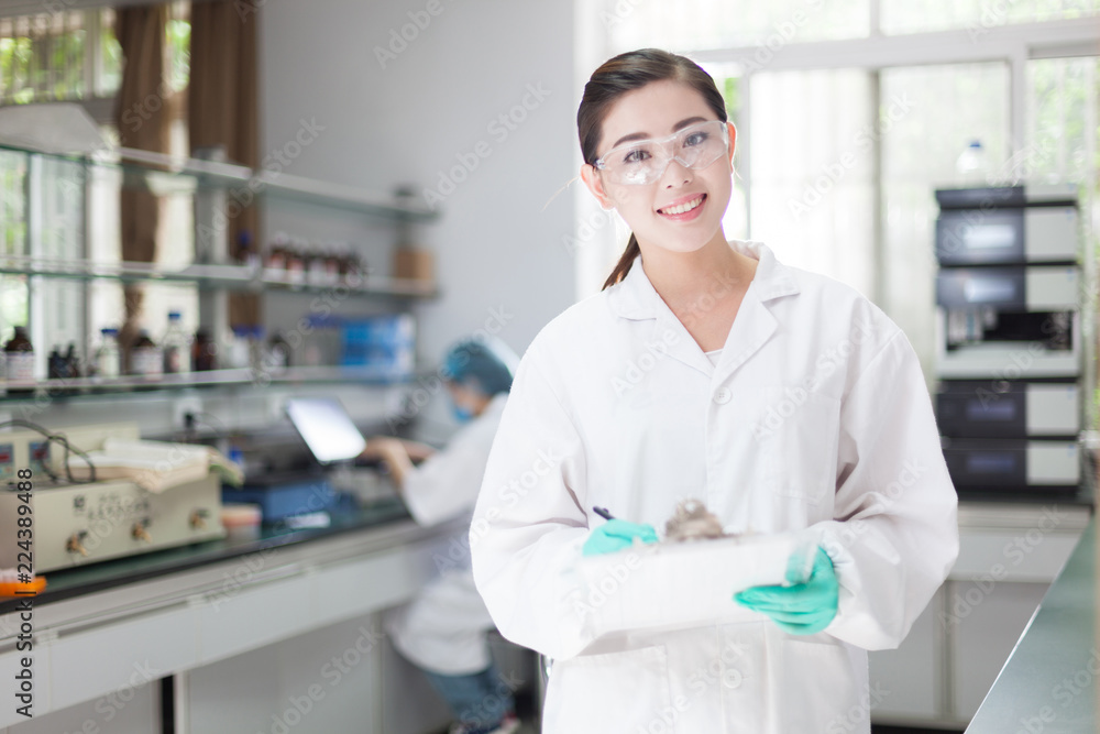 people working at laboratory people working at laboratory
