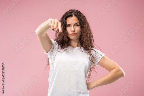 I choose you and order. Overbearing business woman point you, want you, half length closeup portrait on pink studio background. The human emotions, facial expression concept. Front view. Trendy colors
