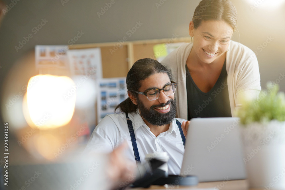 Start-up people working together in office Start-up people working together in office