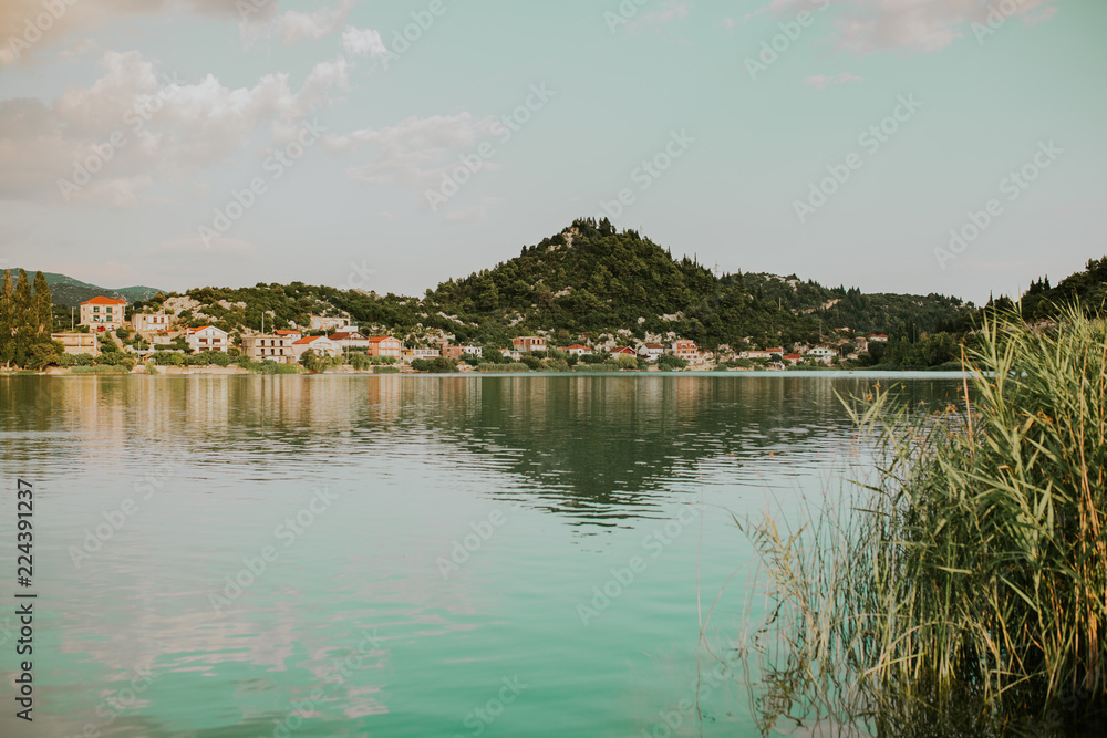 landscape with lake and trees landscape with lake and trees