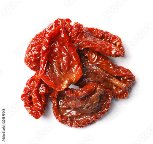 Tasty sun dried tomatoes on white background, top view