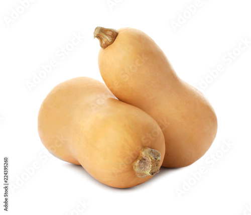Fotografie Fresh raw pumpkins isolated on white. Organic plant