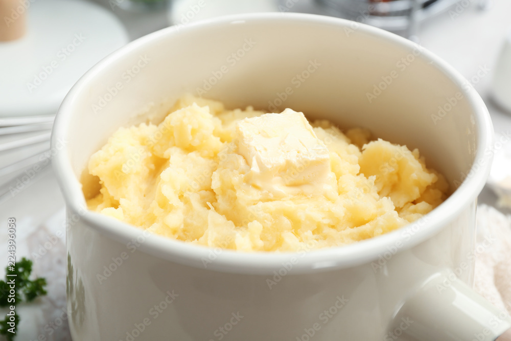 Saucepan with tasty mashed potato on table, closeup Saucepan with tasty mashed potato on table, closeup