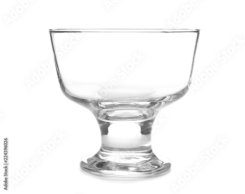 Glass dessert bowl on white background. Washing dishes