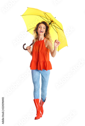 Woman with yellow umbrella on white background © New Africa