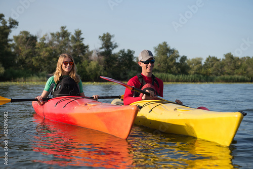 Couple in kayak on the river