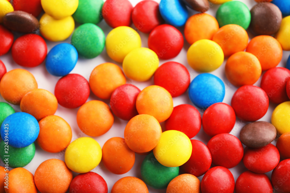 Many colorful candies as background, top view Many colorful candies as background, top view
