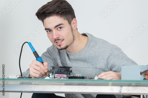 using soldering iron