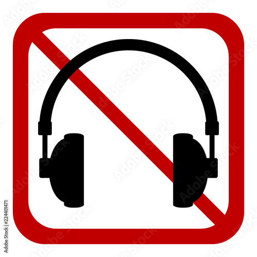 Prohibition sign headphones on white.