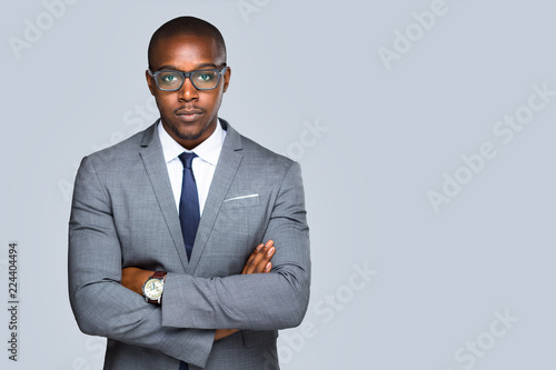 Isolated serious african american business man, lawyer, attorney looking strong and confident