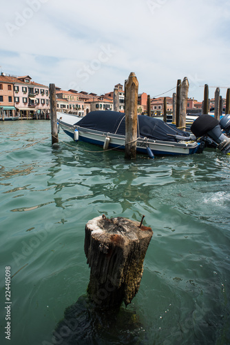 Boat in the water canals of Venice © Aleksey