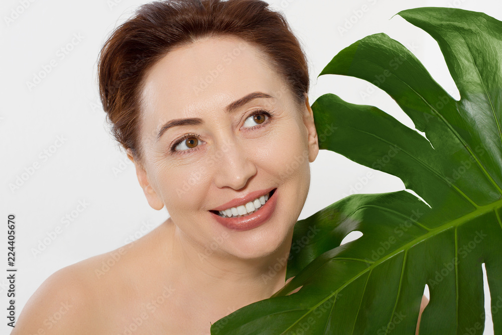 Beauty wrinkle middle age woman face portrait. Spa and anti aging concept Isolated on white background. Plastic surgery and collagen face injections. Wrinkles and menopause. Copy space Beauty wrinkle middle age woman face portrait. Spa and anti aging concept Isolated on white background. Plastic surgery and collagen face injections. Wrinkles and menopause. Copy space