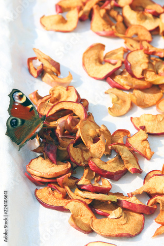 Butterfly and dried apples