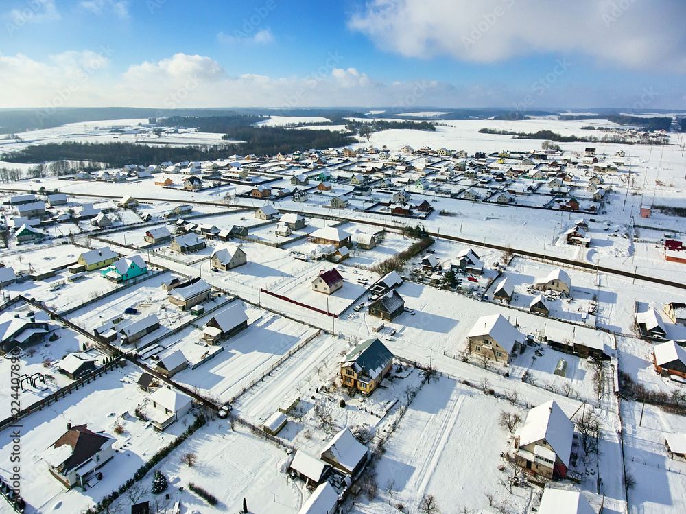 many village houses in the snow