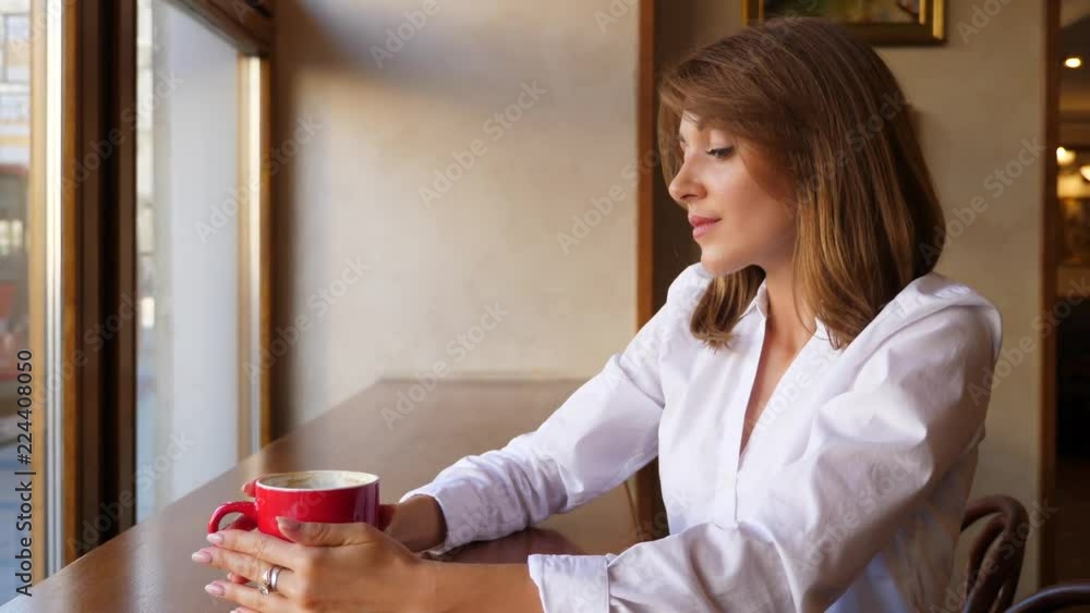 Elegant business woman drink coffee at restaurant Elegant business woman drink coffee at restaurant