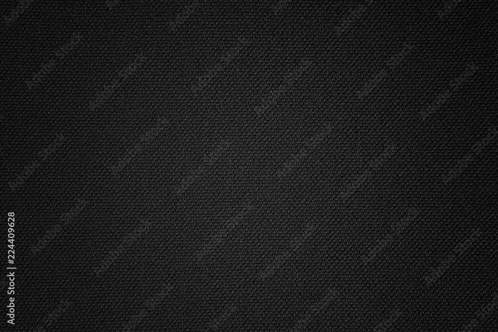 Black texture of synthetic fabric. Textile background. Black texture of synthetic fabric. Textile background.