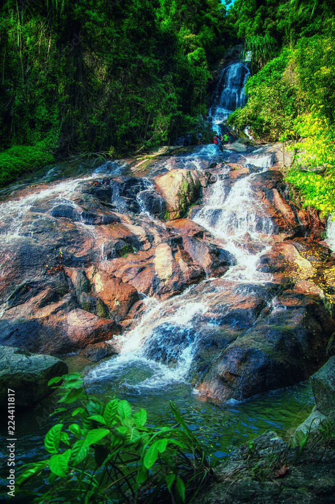 Obraz premium Waterfall with pool in tropical jungle, Na Muang, Koh Samui