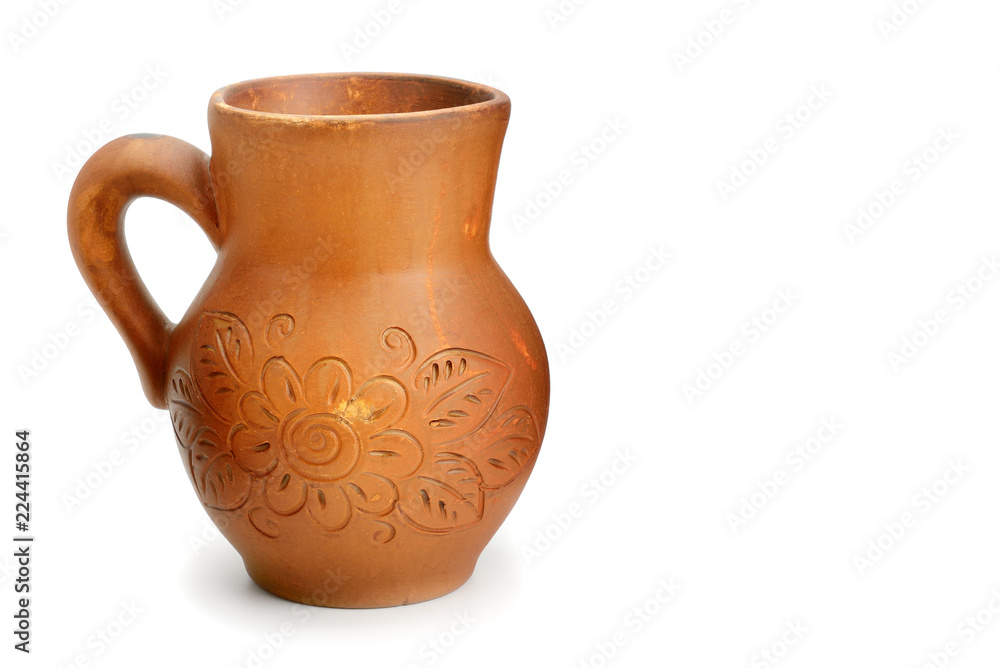 Beautiful clay jug isolated on white background. Free space for text.