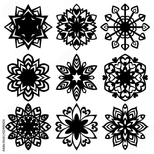 Set silhouette of snowflakes icons on white background
