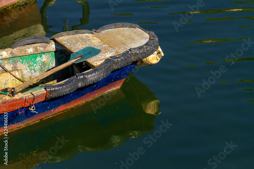 Prow of a small unweaned rowing boat photo