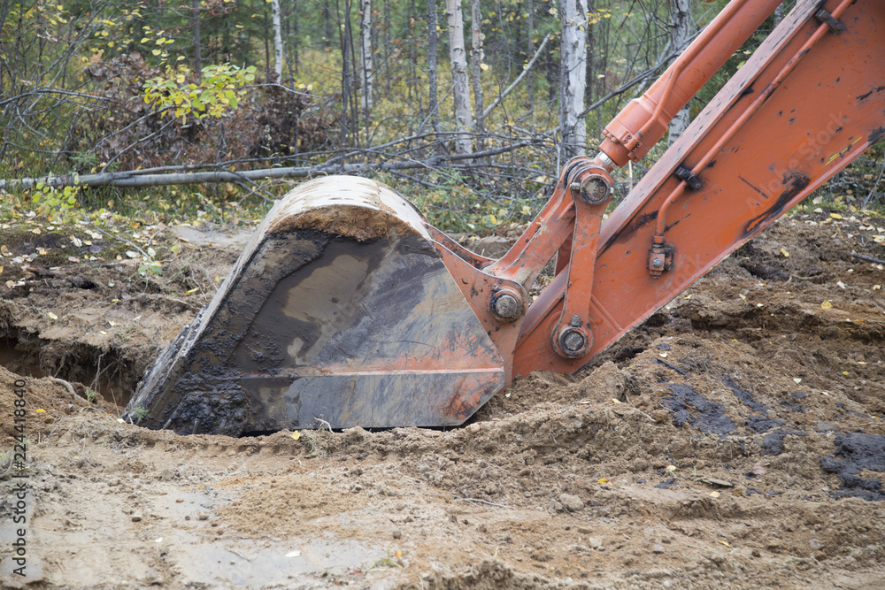 excavator bucket in operation