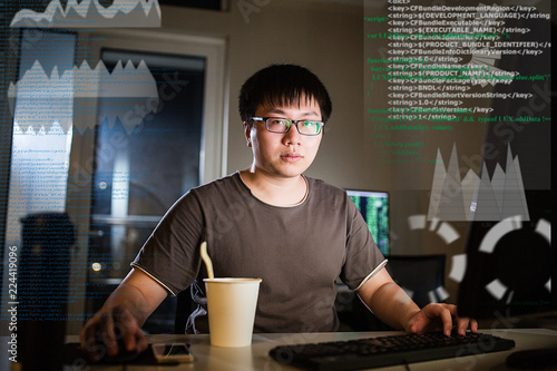 young man working with computer photo