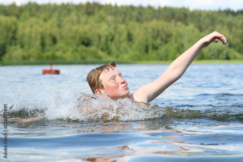 Fototapeta premium Boy play in water