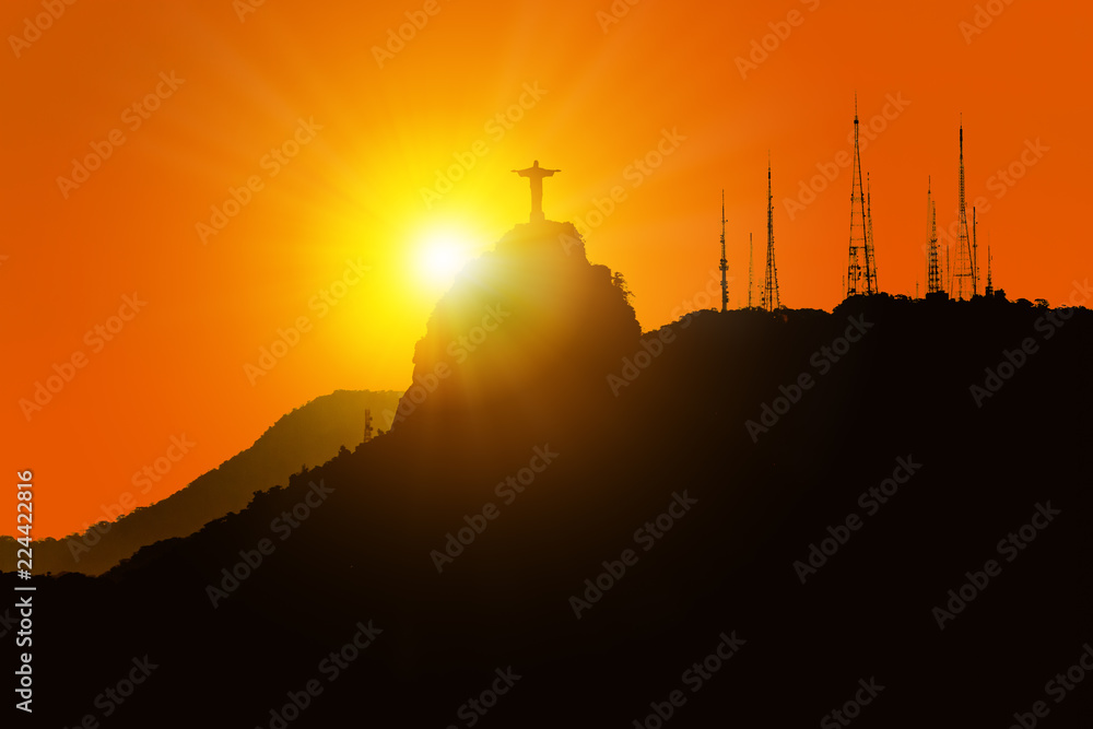 Silhouette of the hill Corcovado with the Christ the Redeemer statue during sunset (Rio de Janeiro, Brazil) Silhouette of the hill Corcovado with the Christ the Redeemer statue during sunset (Rio de Janeiro, Brazil)