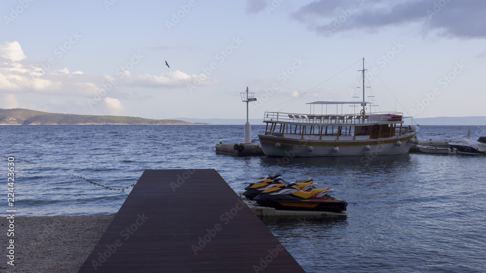 Fototapeta premium Anchored cruise ship and water scooters (2)