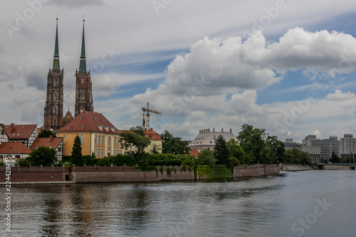 View on river. The city of Kraków is full of historical buildings, churches, bridges and other historical monuments found on every corner. The most visited places include the churches that have a grea