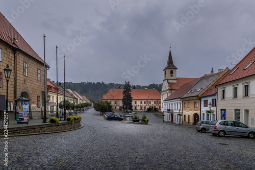 City square in Namest nad Oslavou is a town in the Vyso_ina Region of the Czech Republic. The city is famous for the Little Charles Bridge  which is a smaller replica of the Charles Bridge in Prague.