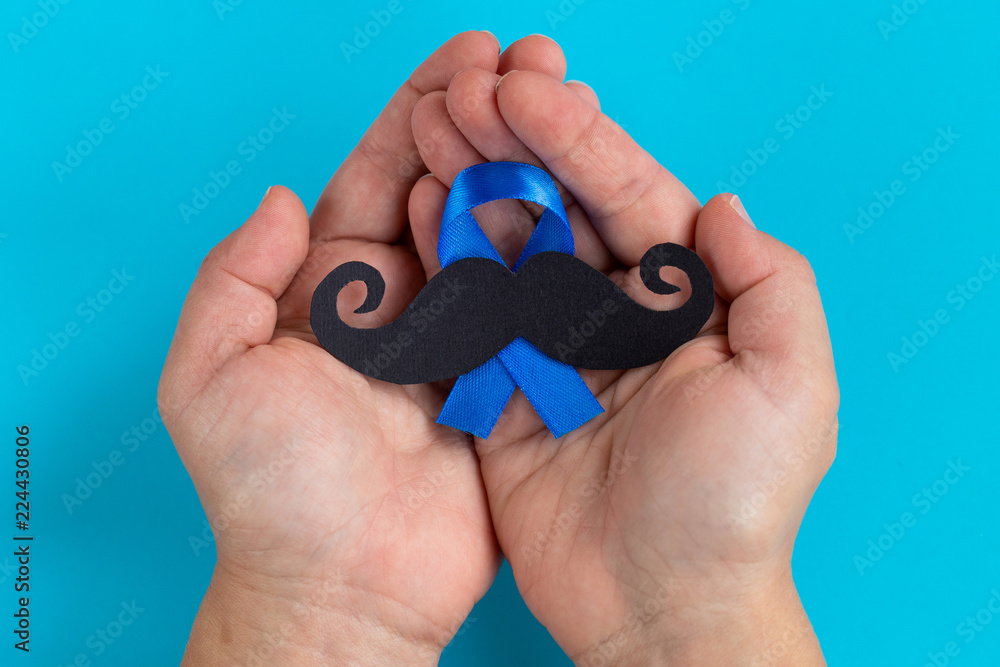 Fototapeta premium Mustache pattern with blue ribbon symbol. November movember concept.