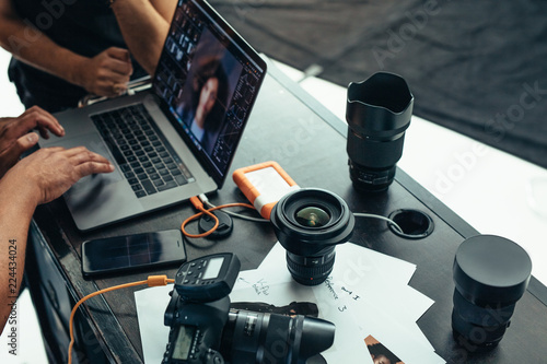 Equipments of a photographer on a table photo