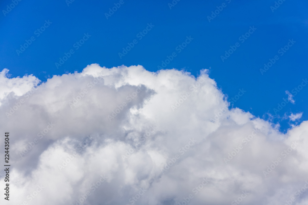 deep blue sky with big fluffy white cloud deep blue sky with big fluffy white cloud