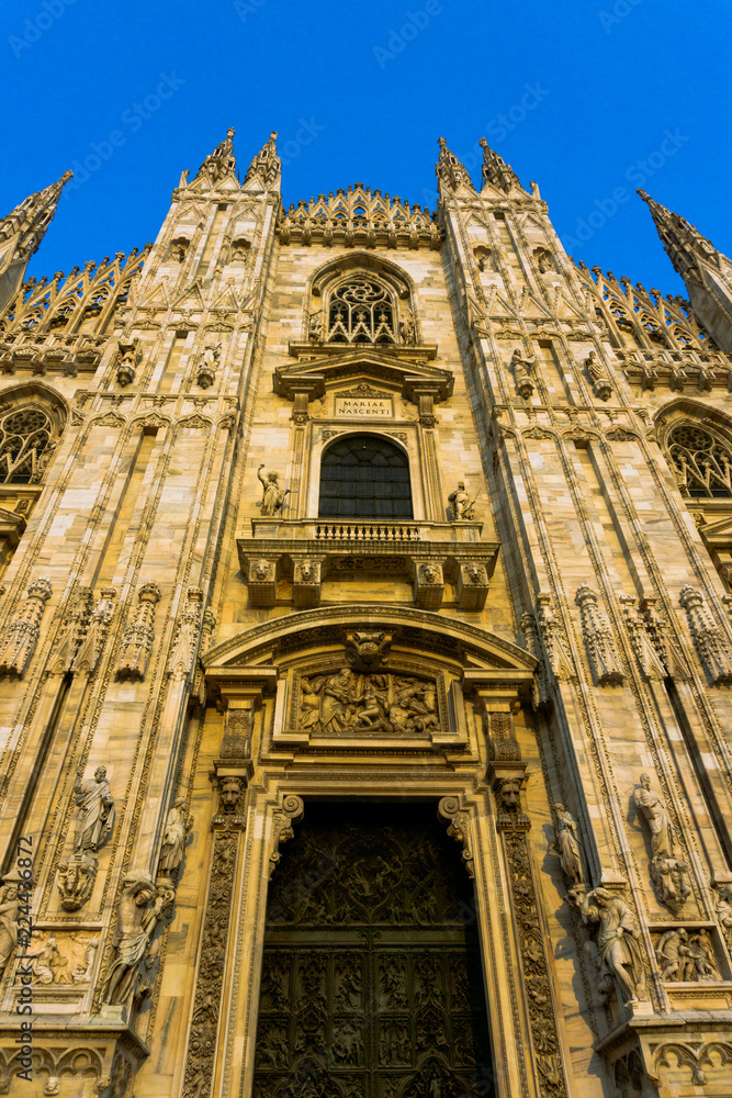 Detail of the facade of the famous Duomo Cathedral in the city of Milan, Italy.