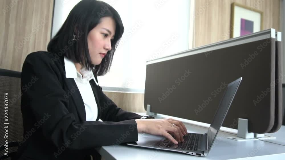 Asian business woman working in a office,Thailand people,Secretary girl speeding delivery work boss. Asian business woman working in a office,Thailand people,Secretary girl speeding delivery work boss.