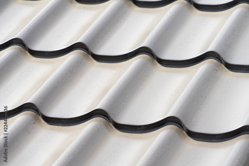 roofing material is waiting for installation on the roof. roofing material is waiting for installation on the roof.
