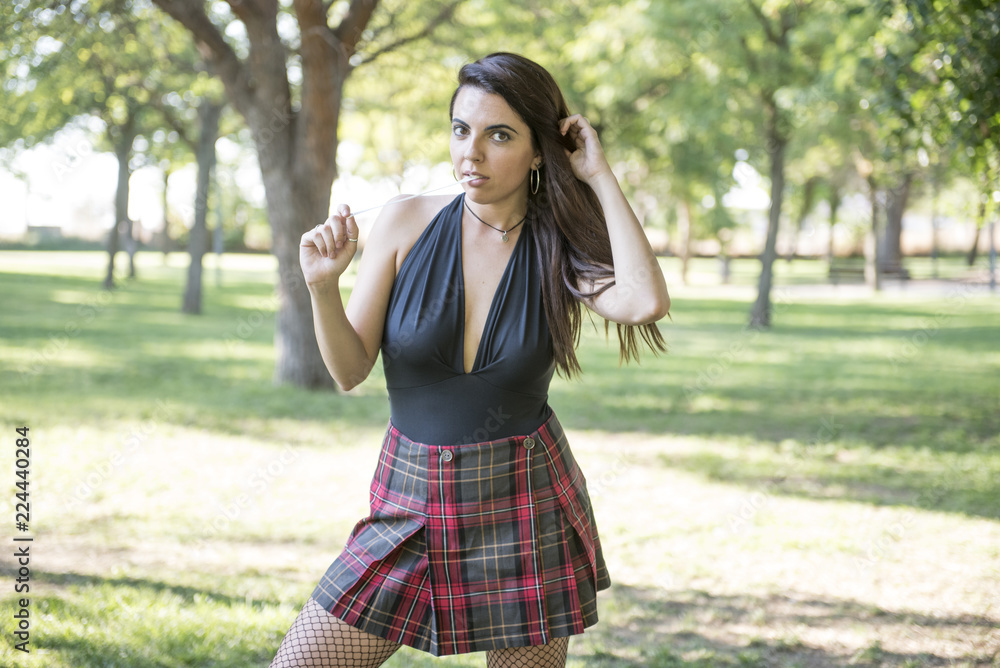 Beautiful woman posing in the park