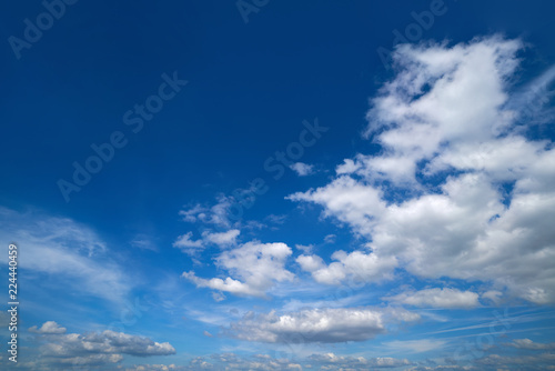 Blue sky white summer cumulus clouds