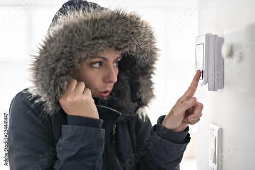 Foto Woman With Warm Clothing Feeling The Cold Inside House