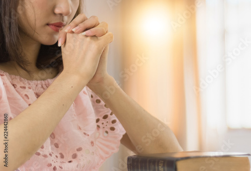 Beautiful woman hands praying.