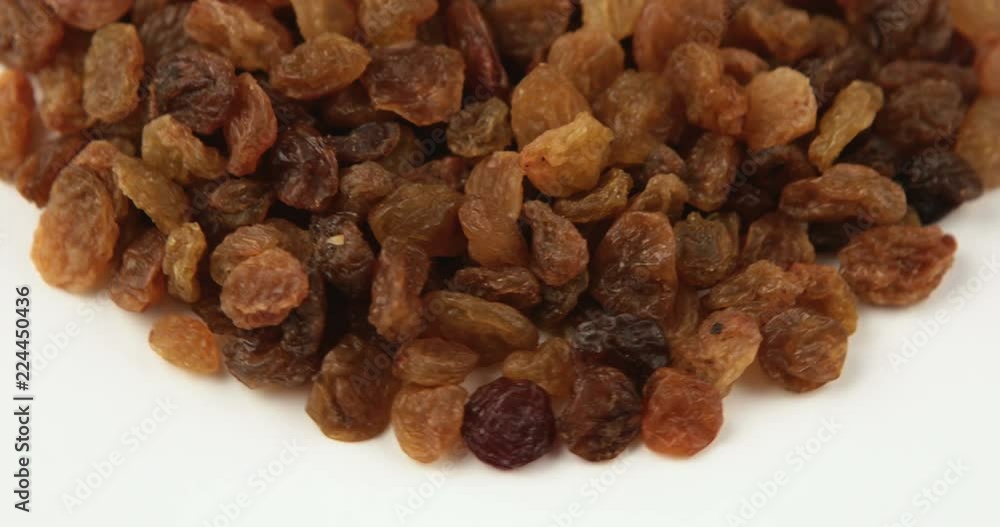 Raisin grains rotating pattern macro texture background Raisin grains rotating pattern macro texture background