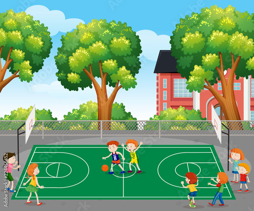 Kids playing basketball scene photo